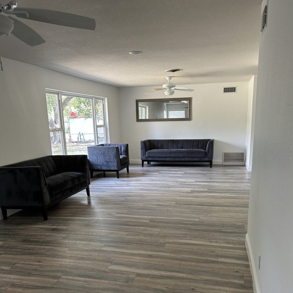 Bright living room with clean wood floors